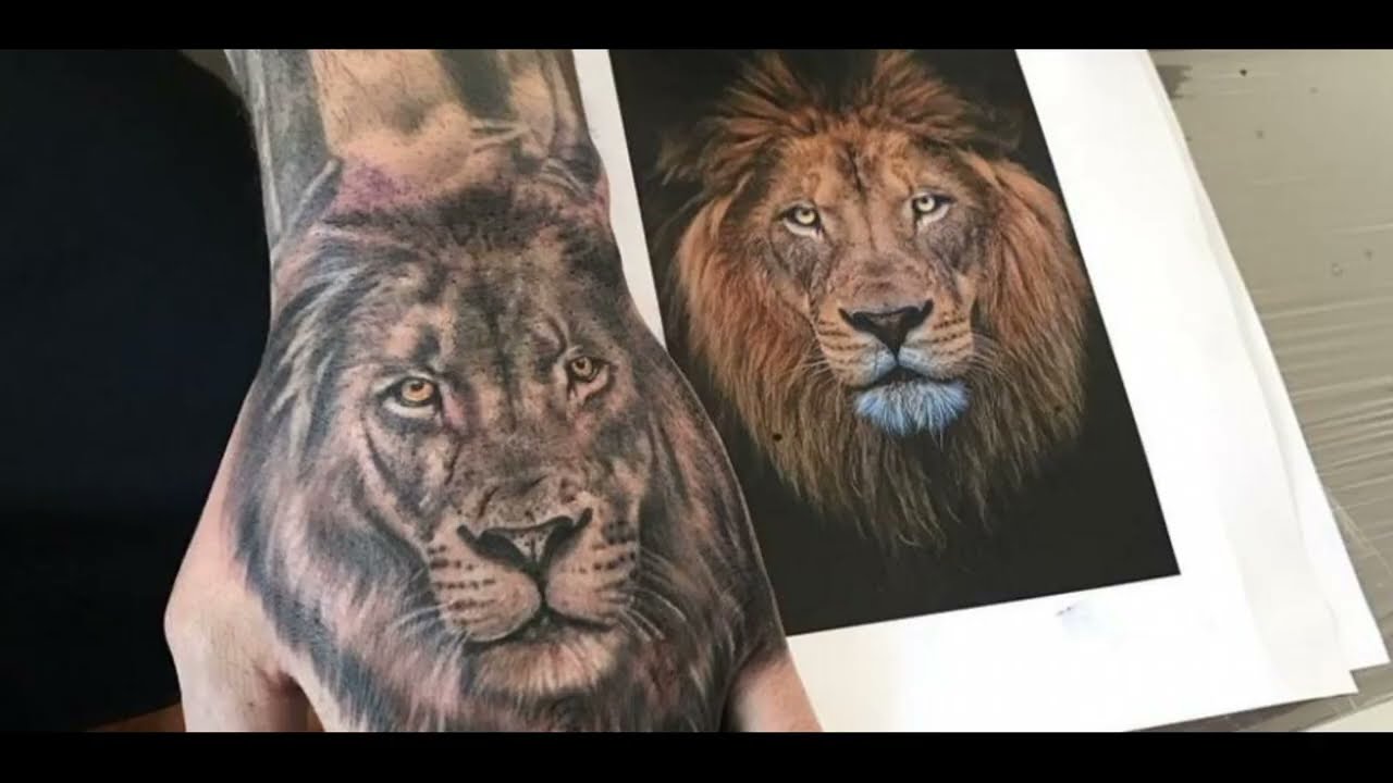 tatuajes de león en la mano para hombres